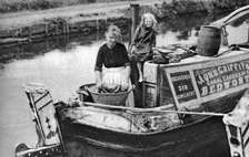 Washing day on the canal boat, 1926-1927. Artist: Unknown