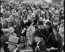 A Large Crowd of Smartly Dressed People in Hats at Ascot Horse Racing Track, 1931. Creator: British Pathe Ltd.