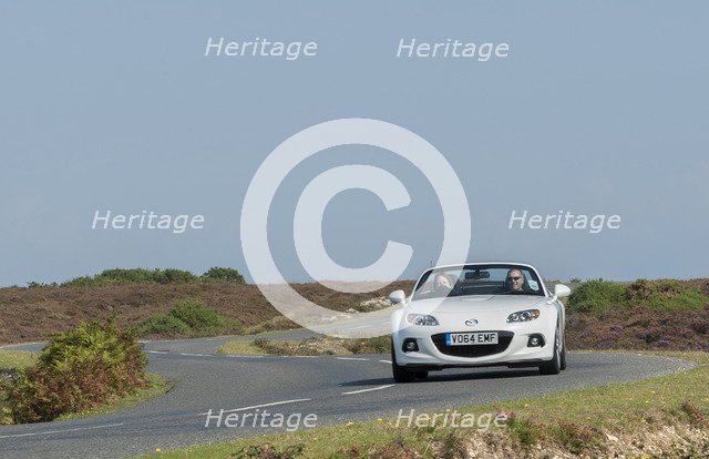 2014 Mazda MX5 Roadster Coupe Artist: Unknown.