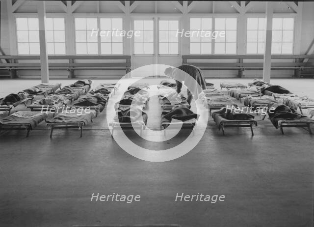 Rest time in nursery school for migrant children at Shafter Camp, California, 1939. Creator: Dorothea Lange.