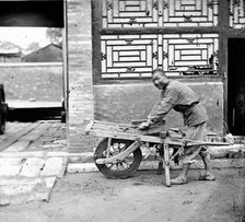 Peking, Pechili province, China: a knife-grinder, 1869. Creator: John Thomson.
