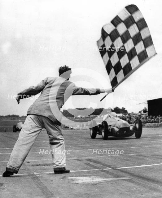 Alfa Romeo 158, Nino Farina winning International Trophy race at Silverstone in 1950. Creator: Unknown.