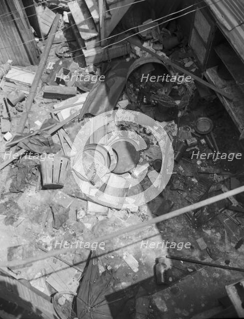 Interiors of wrecked homes on Independence Avenue..., Washington, D.C, 1942. Creator: Gordon Parks.