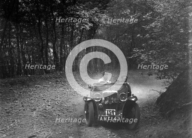 MG J2 competing in the B&HMC Brighton-Beer Trial, Fingle Bridge Hill, Devon, 1934. Artist: Bill Brunell.