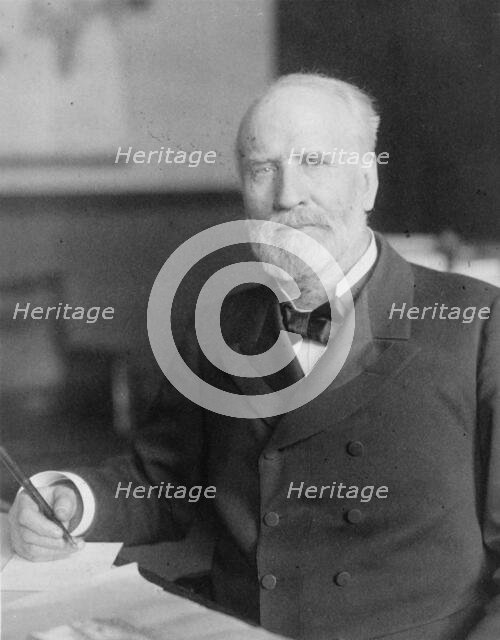 James Wilson, half-length portrait, seated at desk, facing slightly left, c1906. Creator: Frances Benjamin Johnston.