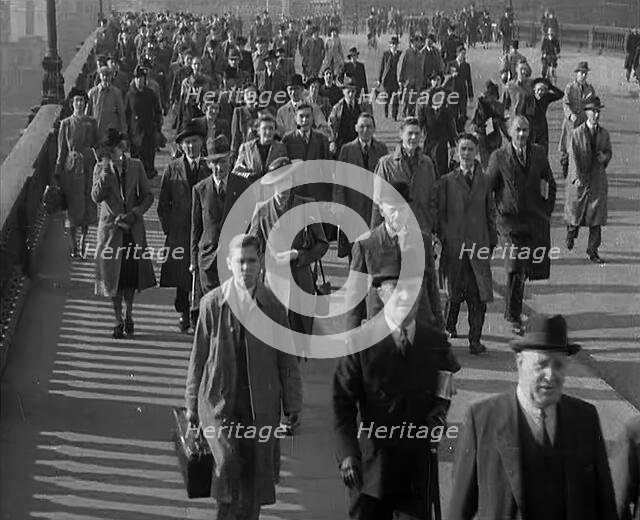 Civilians Crossing a Bridge in London, 1940. Creator: British Pathe Ltd.