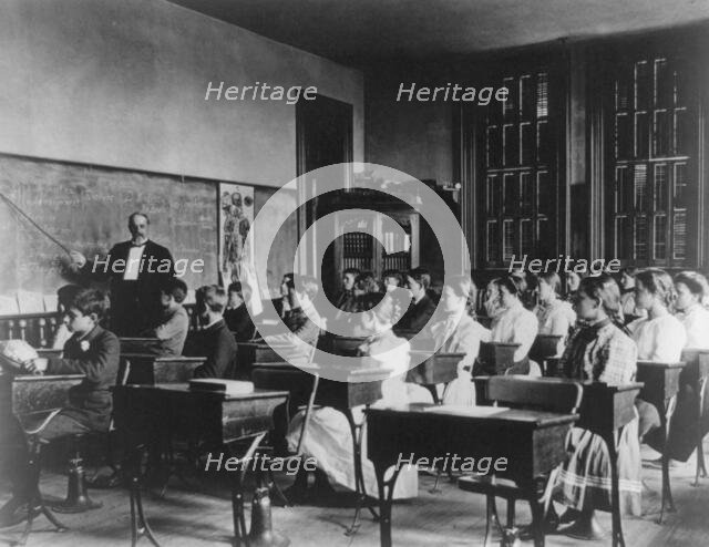 School children studying anatomy or health, Washington, D.C., (1899?). Creator: Frances Benjamin Johnston.