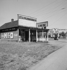 Cafe on U.S. 99, formerly the "Oasis", Centralia, Lewis County, Washington, 1939. Creator: Dorothea Lange.