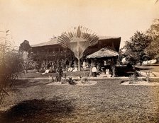 Singapore: a large bungalow with people having drinks in the garden around a large..., 1881. Creator: John Edmund Taylor.