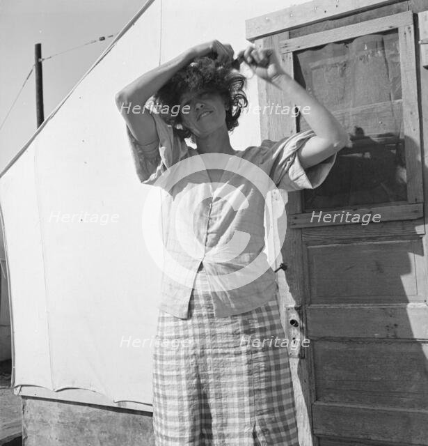 In a carrot pullers' camp near Holtville, Imperial Valley, California, 1939. Creator: Dorothea Lange.
