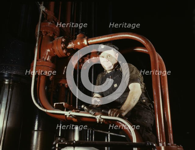 Maintenance mechanic in largest coal press..., Combustion Engineering Co., Chattanooga, Tenn., 1942. Creator: Alfred T Palmer.