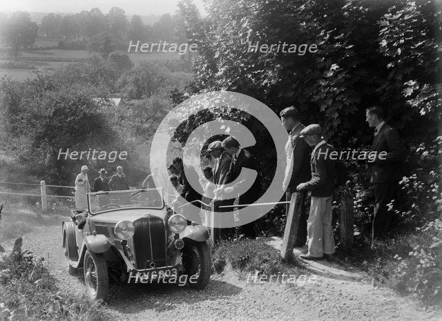 Triumph 2-seater taking part in a West Hants Light Car Club Trial, Ibberton Hill, Dorset, 1930s. Artist: Bill Brunell.