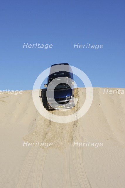 Mitsubishi Delica Space Gear V6 1996 in sand dunes New South Wales Australia Artist: Unknown.