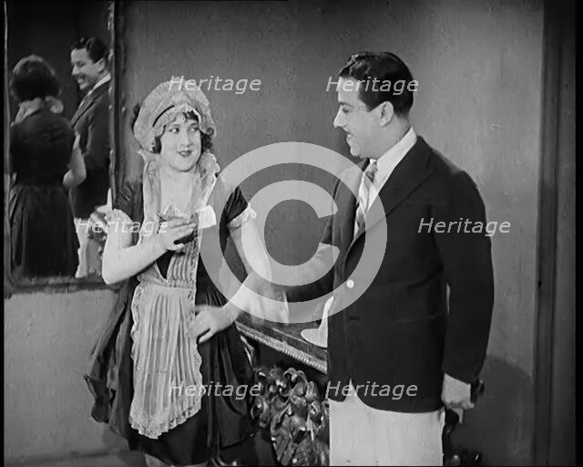 Scene from the Film 'The Compulsory Husband': The Actor Monty Banks Arriving at the House..., 1920s. Creator: British Pathe Ltd.