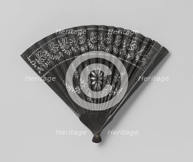 Paper mourning fan with white floral motif..., c.1850-c.1899.  Creator: Anon.