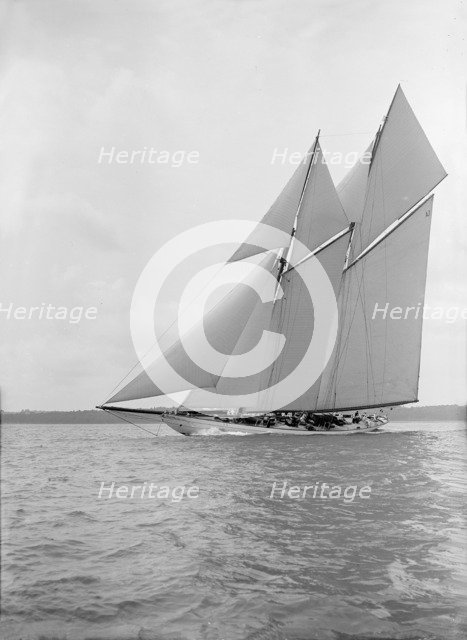 The 250 ton schooner 'Germania' sails close-hauled, 1913. Creator: Kirk & Sons of Cowes.