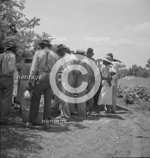 Lunchtime for cotton hoers, Mississippi Delta, 1937. Creator: Dorothea Lange.