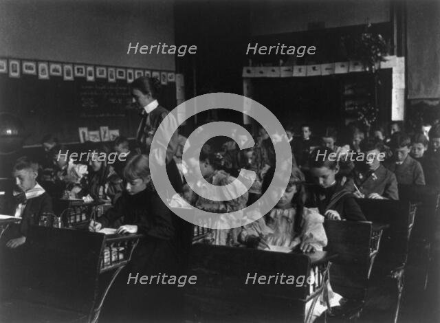 7th Division grade school pupils working in classroom, Washington, D.C., (1899?). Creator: Frances Benjamin Johnston.
