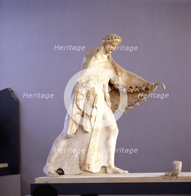 Statue of Athena from the ancient Temple of Athena on the Acropolis, c525 BC. Artist: Unknown.