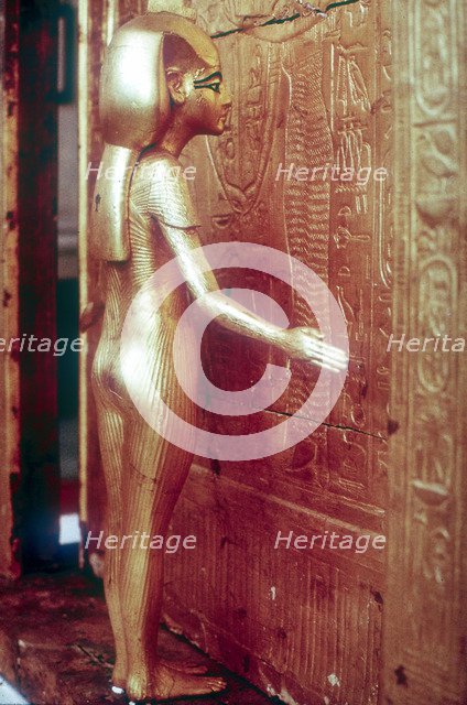 Isis the protective goddess guarding the Canopic Shrine, Tomb of Tutankhamun, Cairo. Artist: Unknown