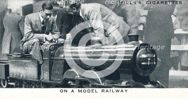'On a Model Railway', 1925 (1937). Artist: Unknown.