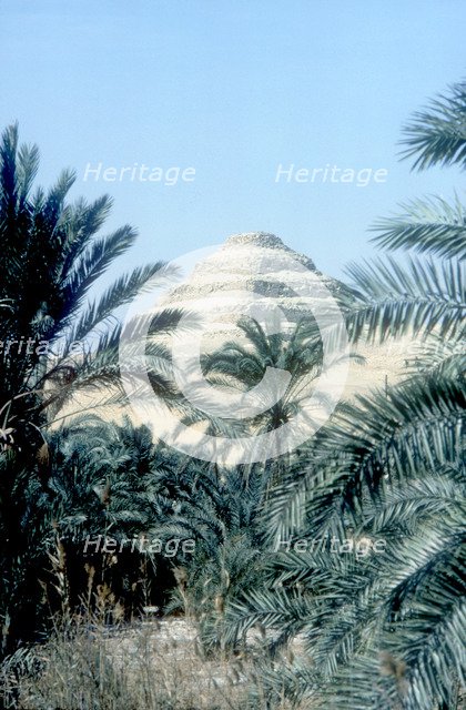 Step Pyramid (behind palms) of King Djoser, Saqqara, Egypt, 3rd Dynasty, c2600 BC. Artist: Imhotep