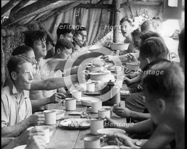 Men Eating Under a Canopy, 1933. Creator: British Pathe Ltd.