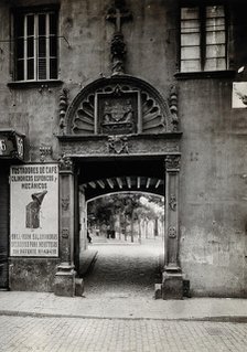 Hospital de la Santa Cruz, Barcelona: the door leading through to the courtyard, c1900. Creator: Unknown.