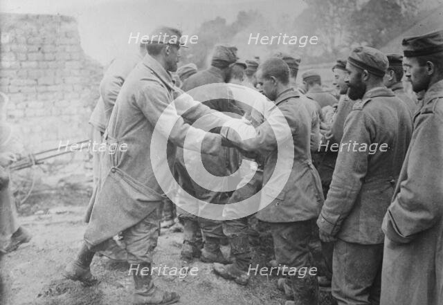Bread to German prisoners, Champagne, between c1915 and c1920. Creator: Bain News Service.