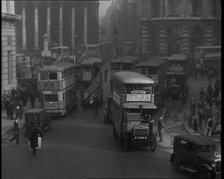 Crowds Walking Around the Streets of London, 1936. Creator: British Pathe Ltd.