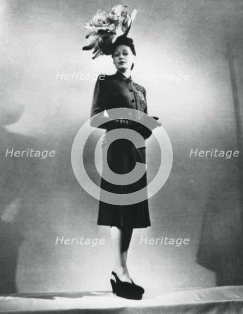 La femme chic, outfit by the French fashion designer Jacques Fath, Paris, January 1943. Artist: Unknown