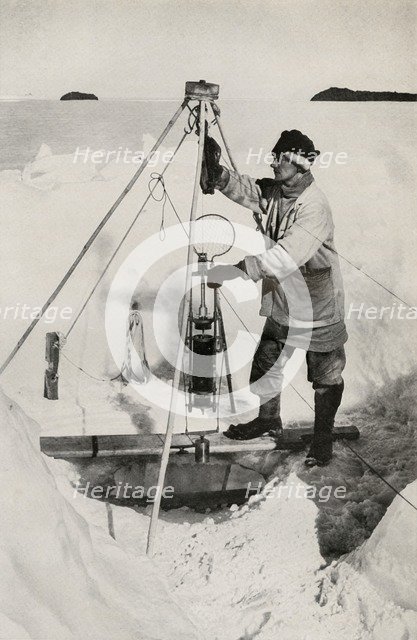 'E. W. Nelson with the Nansen-Petersen Insulated Water-Bottle', c1911, (1913). Artist: Herbert Ponting.