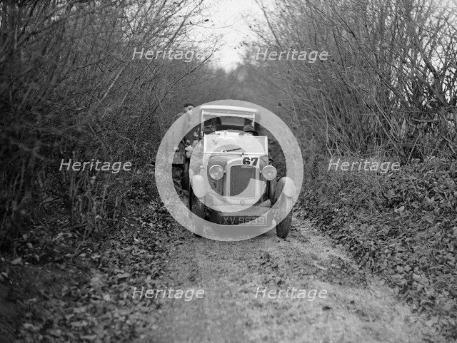 Austin 7 Boyd Carpenter 2-seater sports of GBL Willis taking part in the Inter-Varsity Trial, 1930. Artist: Bill Brunell.
