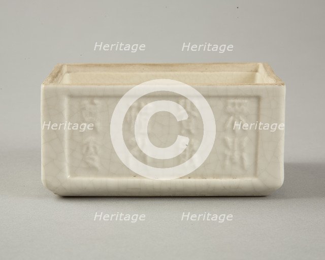Soft paste rectangular vessel with characters in relief, early 19th century. Artist: Unknown.