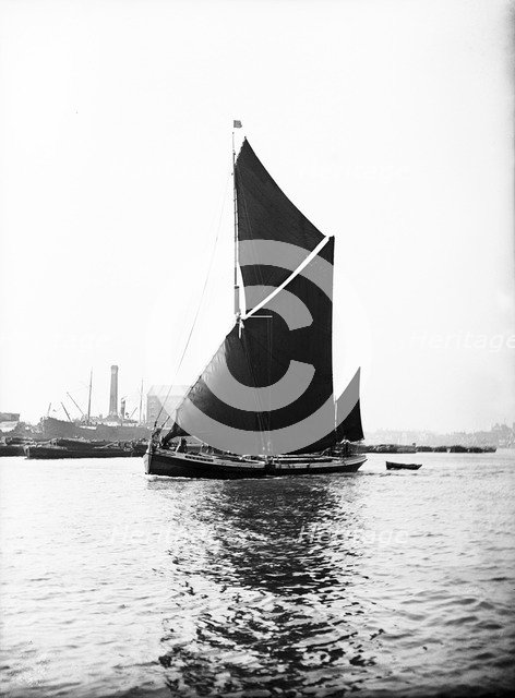 Topsail barge under sail on the Thames, London, c1905. Artist: Unknown