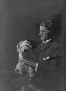 Mr. Arthur Young, with dog, portrait photograph, 1918 Oct. 1. Creator: Arnold Genthe.