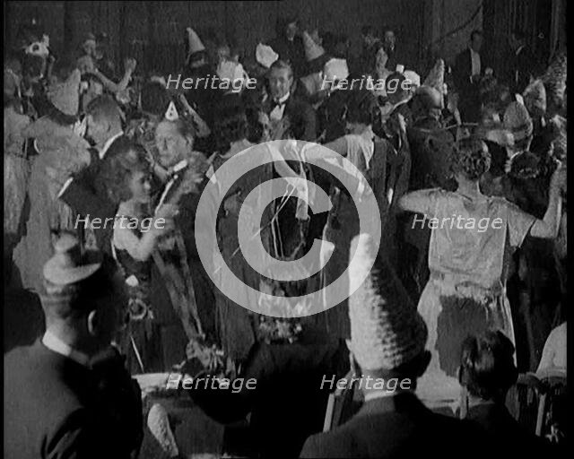 Civilians Dressed in Smart Evening Outfits Dancing in a Fancy Party, 1920. Creator: British Pathe Ltd.