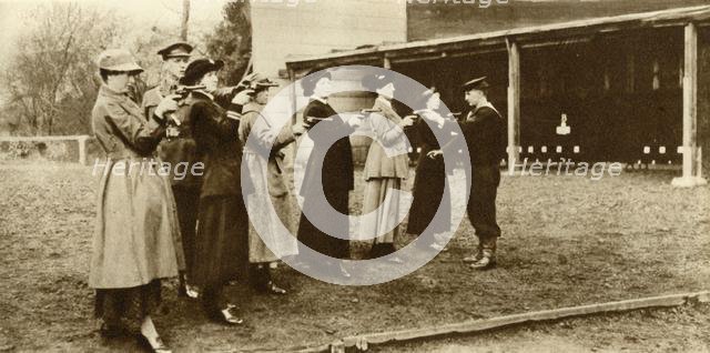 Members of the WRNS at revolver practice, 1915, (1935).  Creator: Unknown.
