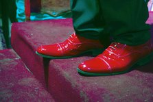 The shiny red shoes of one of the performers from Buena Vista Social Club, Havana, Cuba, 2024. Creator: Ethel Davies.