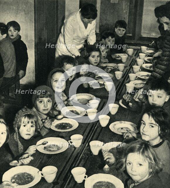 'School Dinner for Evacuated Children', 1943. Creator: Unknown.