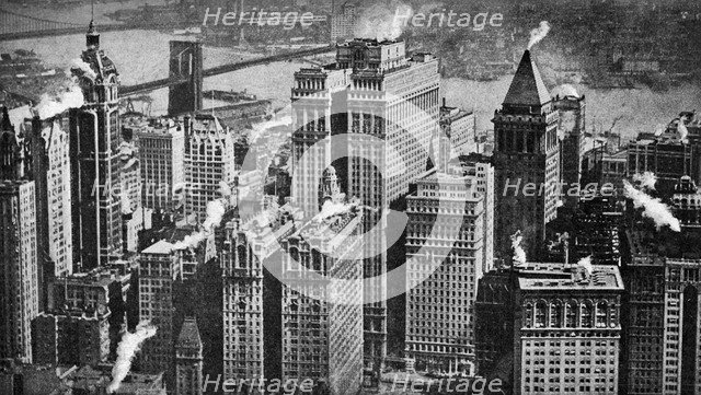 Looking towards Brooklyn over the skyscrapers of Broadway, New York City, USA, c1930s.Artist: Aerofilms