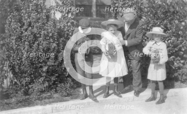 3 children sighting box cameras, c1905. Creator: Frances Benjamin Johnston.