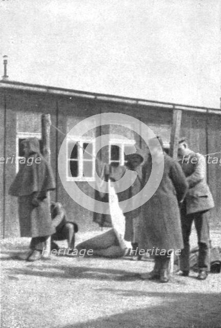 'La peine du poteau; un Belge et un Francais, a Sydow', 1917. Creator: Unknown.