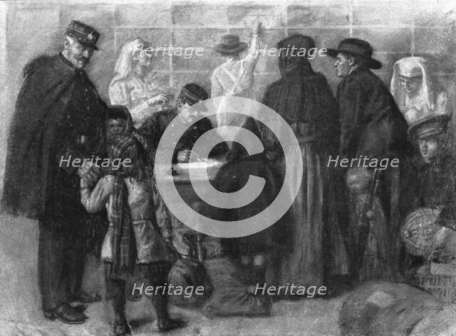 'L'exode devant l'ennemi; Les refugies a Paris: on releve l'identite de chacun et on..., 1918. Creator: Unknown.