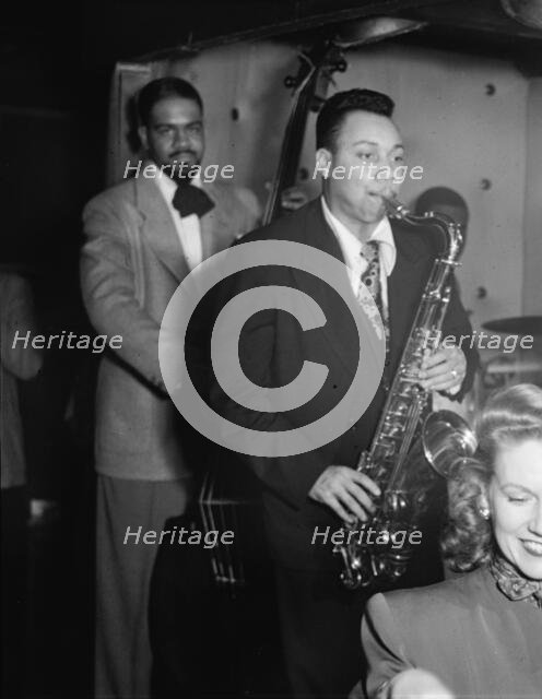 Portrait of Lucky Thompson, Hilda A. Taylor, and Al McKibbon, Three Deuces, N.Y., ca. July 1948. Creator: William Paul Gottlieb.