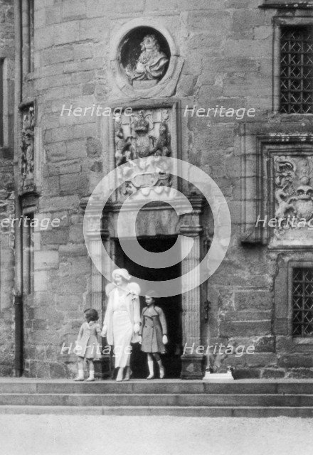 Queen Elizabeth with Princesses Elizabeth and Margaret Rose, Glamis Castle, Scotland, 1937.  Creator: Unknown.