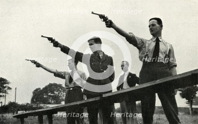 'Revolver practice at the Elementary Flying Training School', 1941. Creator: Charles Brown.