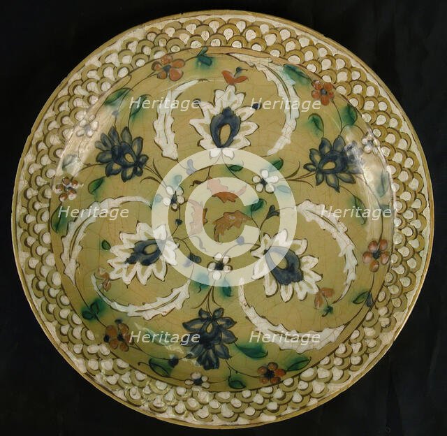 Dish with Floral Designs on an Olive Background, Iran, 16th-17th century. Creator: Unknown.