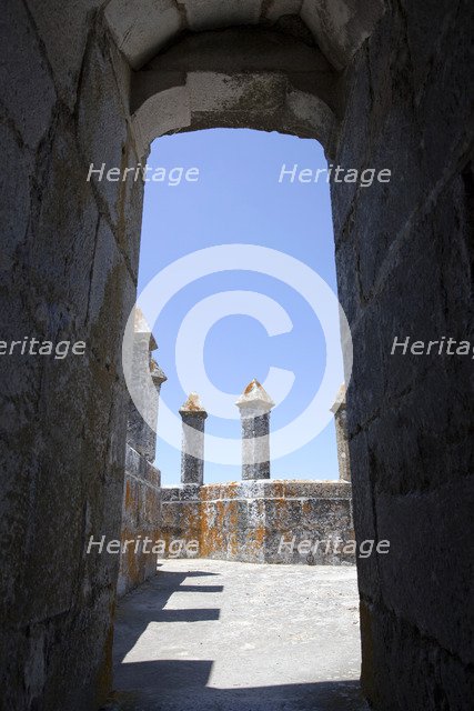 Merlons on the battlements seen through an arched doorway, Beja Castle, Beja, Portugal, 2009.  Artist: Samuel Magal