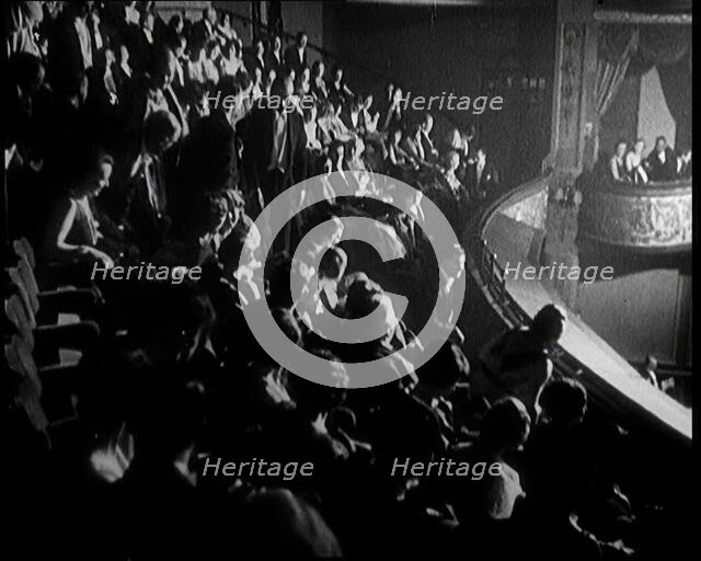Audience Members taking Their Seats at a Show in London, 1922. Creator: British Pathe Ltd.
